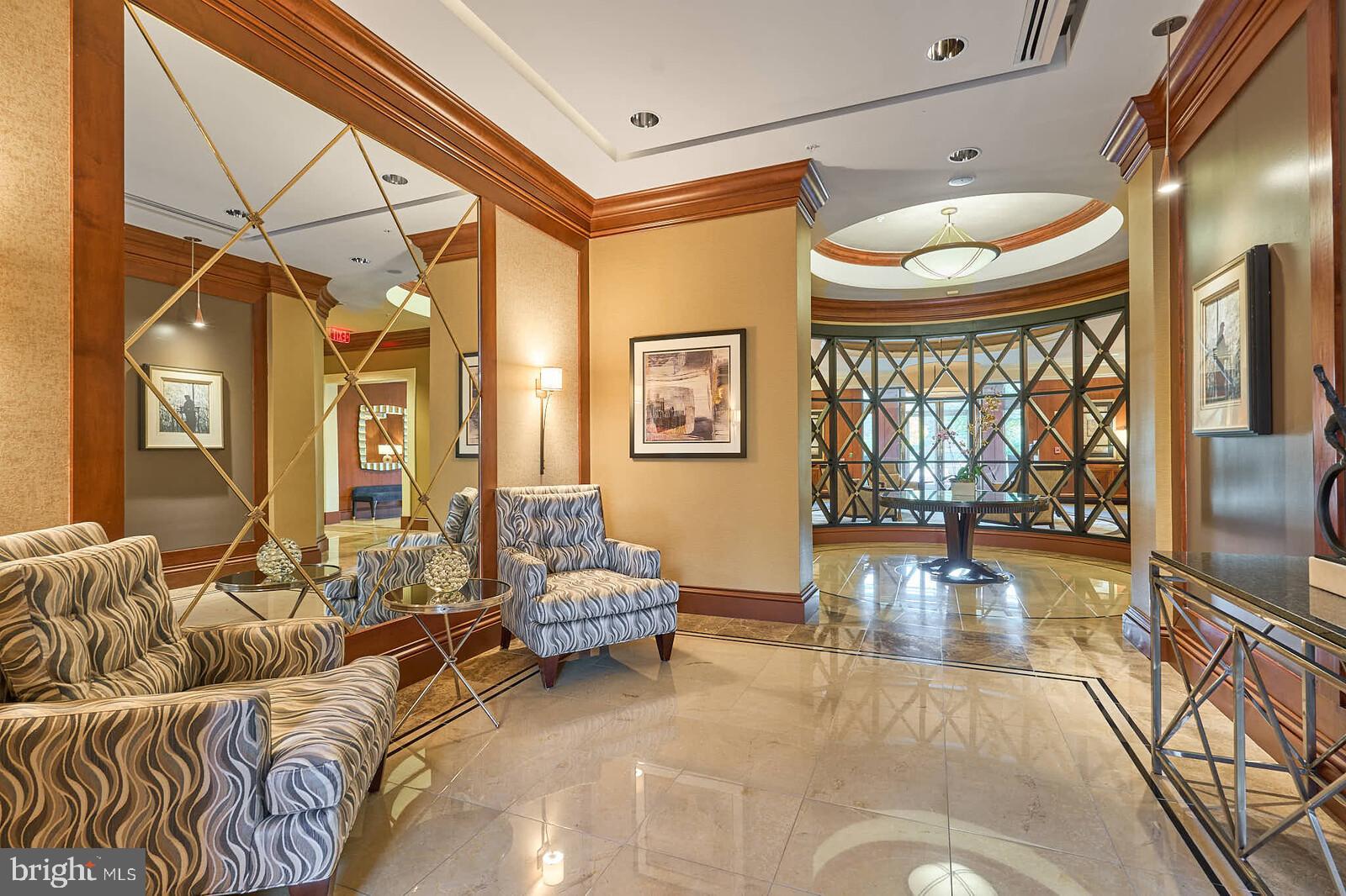 8220 Crestwood Heights Drive, Unit 714 McLean, VA 22102 - Photo 30 of 34 a living room with furniture and a large window
