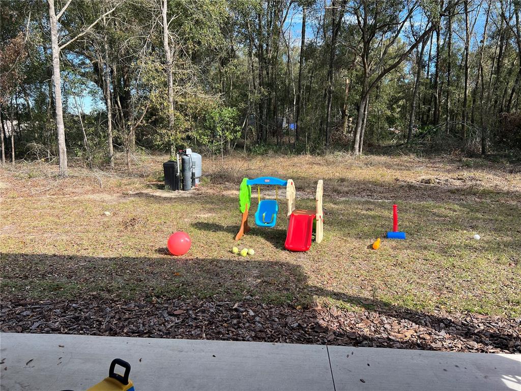 7746 Southeast 70th Avenue Trenton, FL 32693 - Photo 13 of 13 a view of a park with large trees