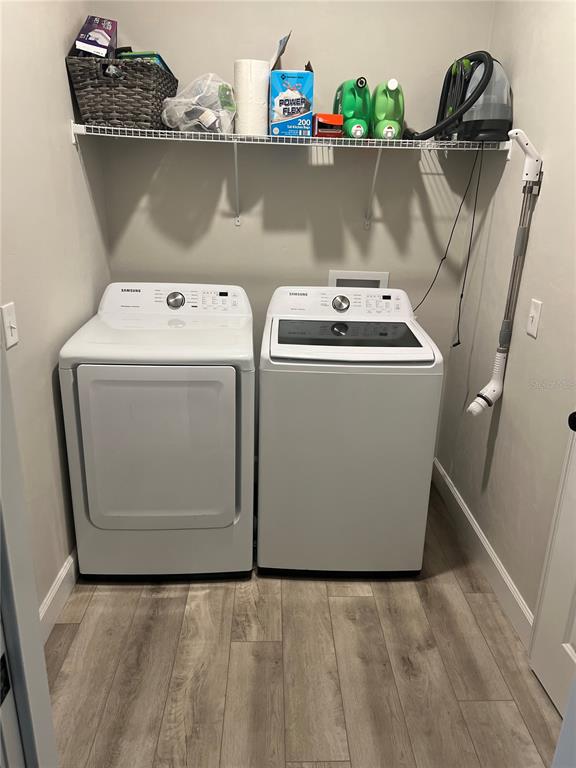7746 Southeast 70th Avenue Trenton, FL 32693 - Photo 9 of 13 a utility room with dryer and washer