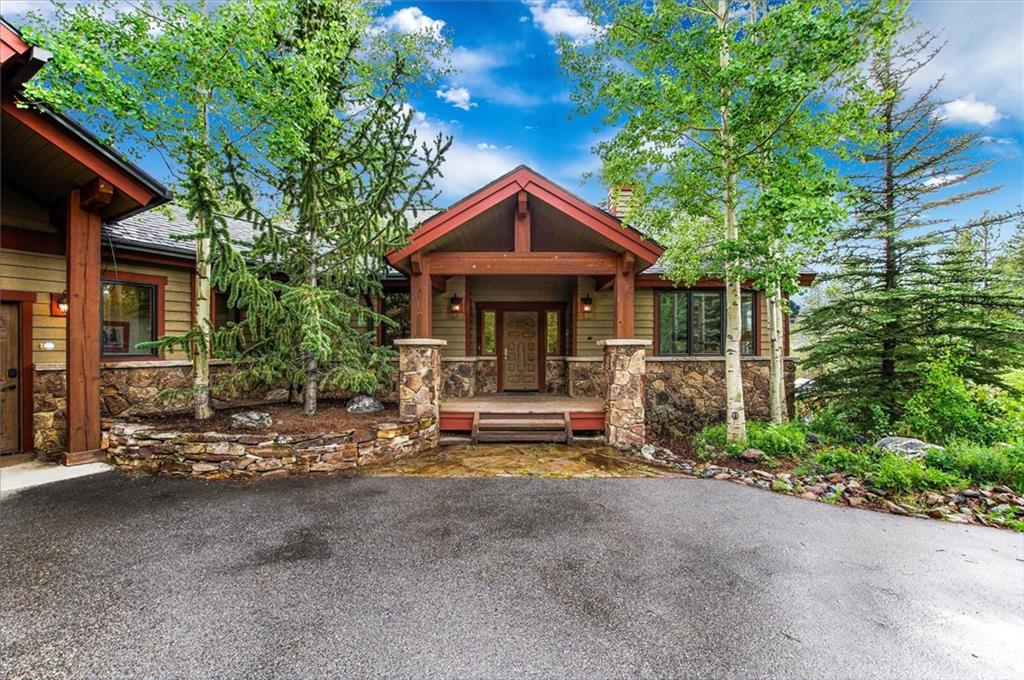 15 Rounds Road Breckenridge, CO 80424 - Photo 1 of 34 a view of a house with large tree and wooden fence
