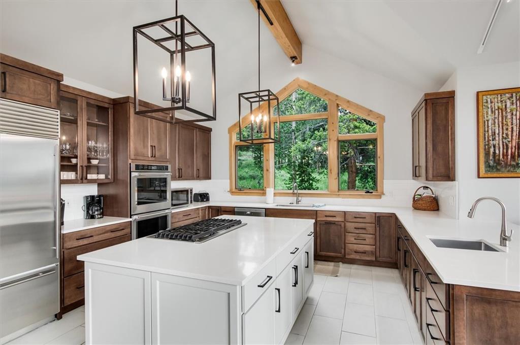 15 Rounds Road Breckenridge, CO 80424 - Photo 14 of 34 a kitchen that has a sink a stove and a microwave