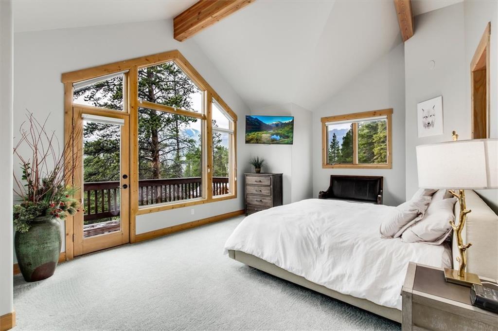 15 Rounds Road Breckenridge, CO 80424 - Photo 16 of 34 a bedroom with a large bed and a large window