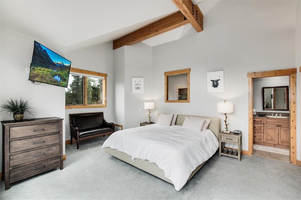 15 Rounds Road Breckenridge, CO 80424 - Photo 19 of 34 a bedroom with a bed and a dresser
