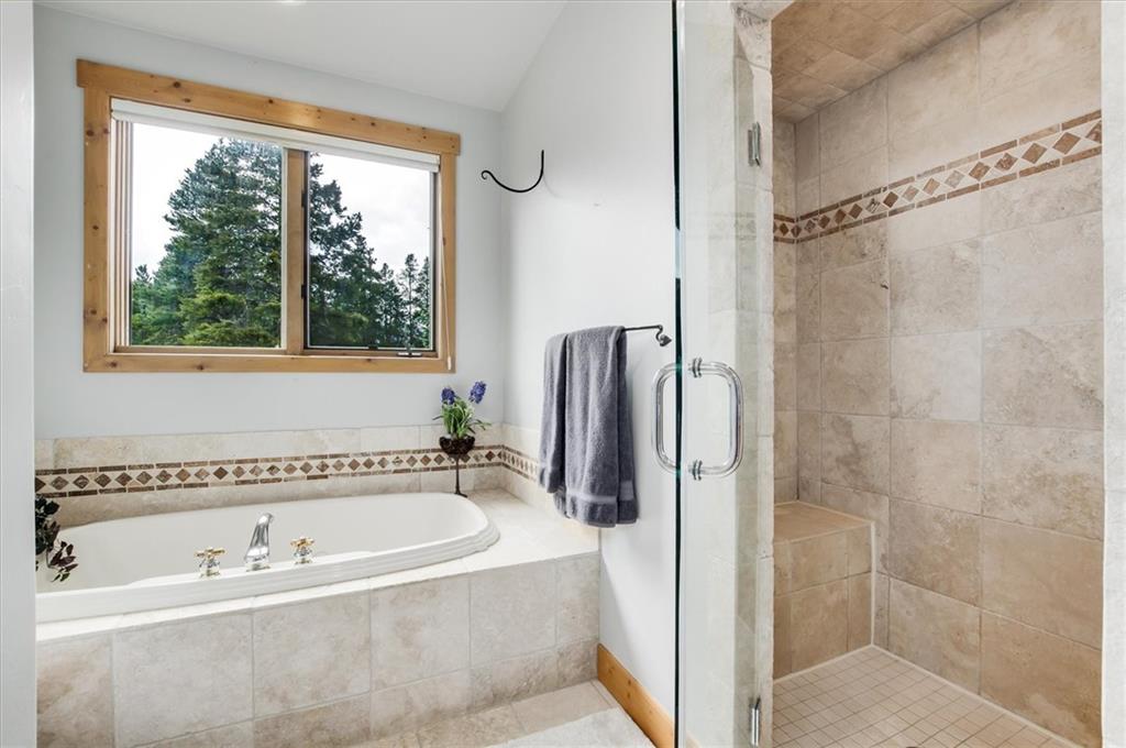 15 Rounds Road Breckenridge, CO 80424 - Photo 21 of 34 a white bath tub sitting next to a shower