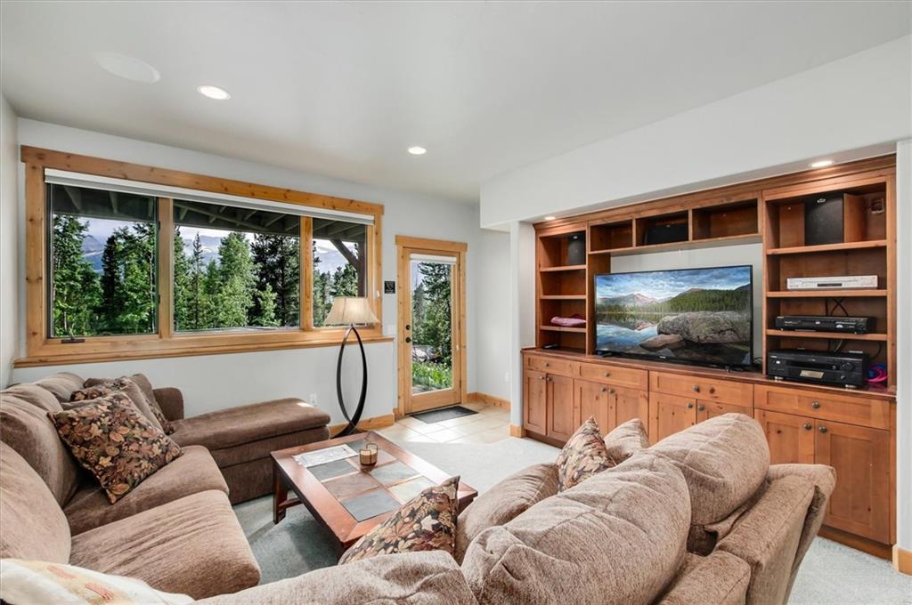 15 Rounds Road Breckenridge, CO 80424 - Photo 24 of 34 a living room with furniture and a flat screen tv