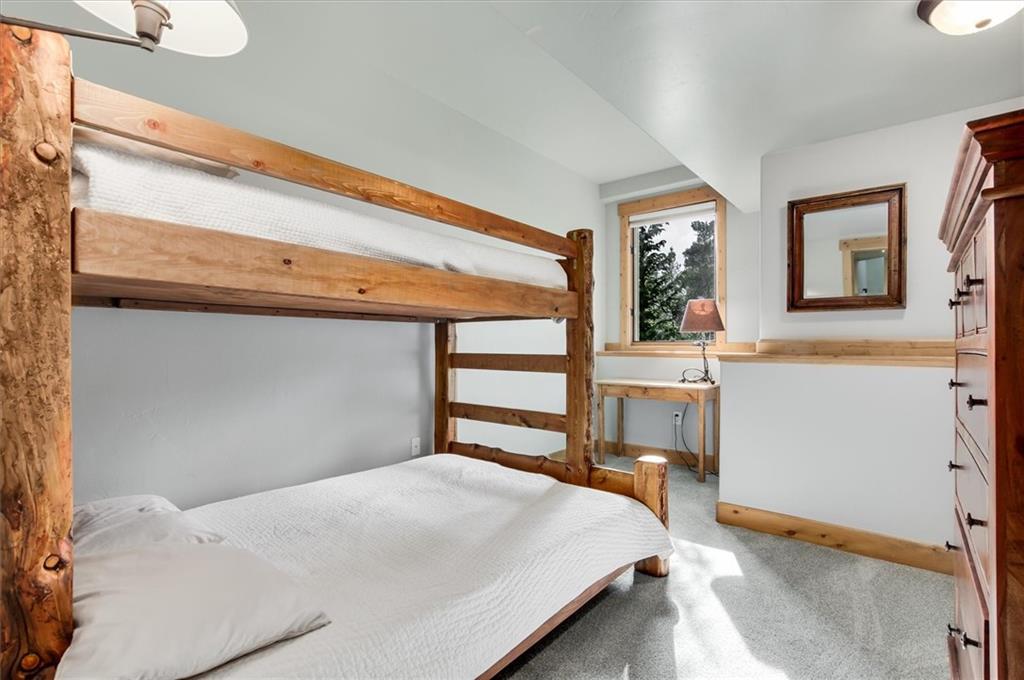 15 Rounds Road Breckenridge, CO 80424 - Photo 28 of 34 a bedroom with a bed dresser and a window