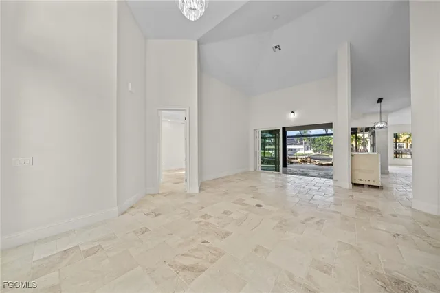 a view of empty room with natural light