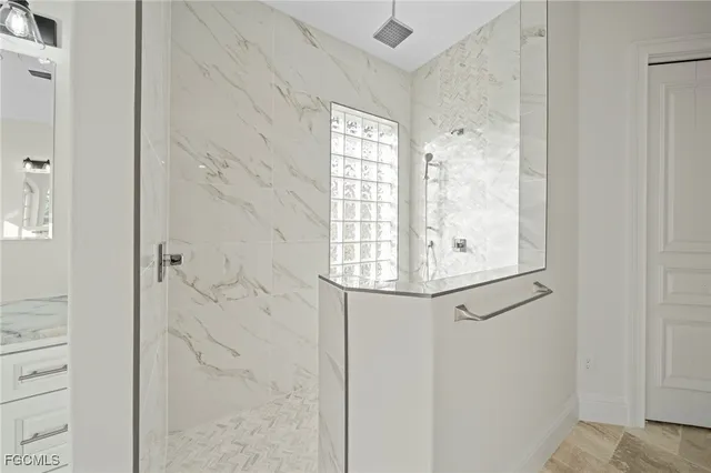 a view of bathroom with window