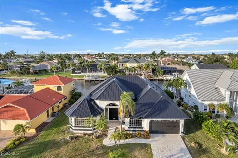 a view of a lake with tall buildings