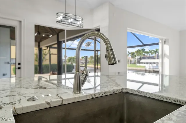 a view of a living room and window
