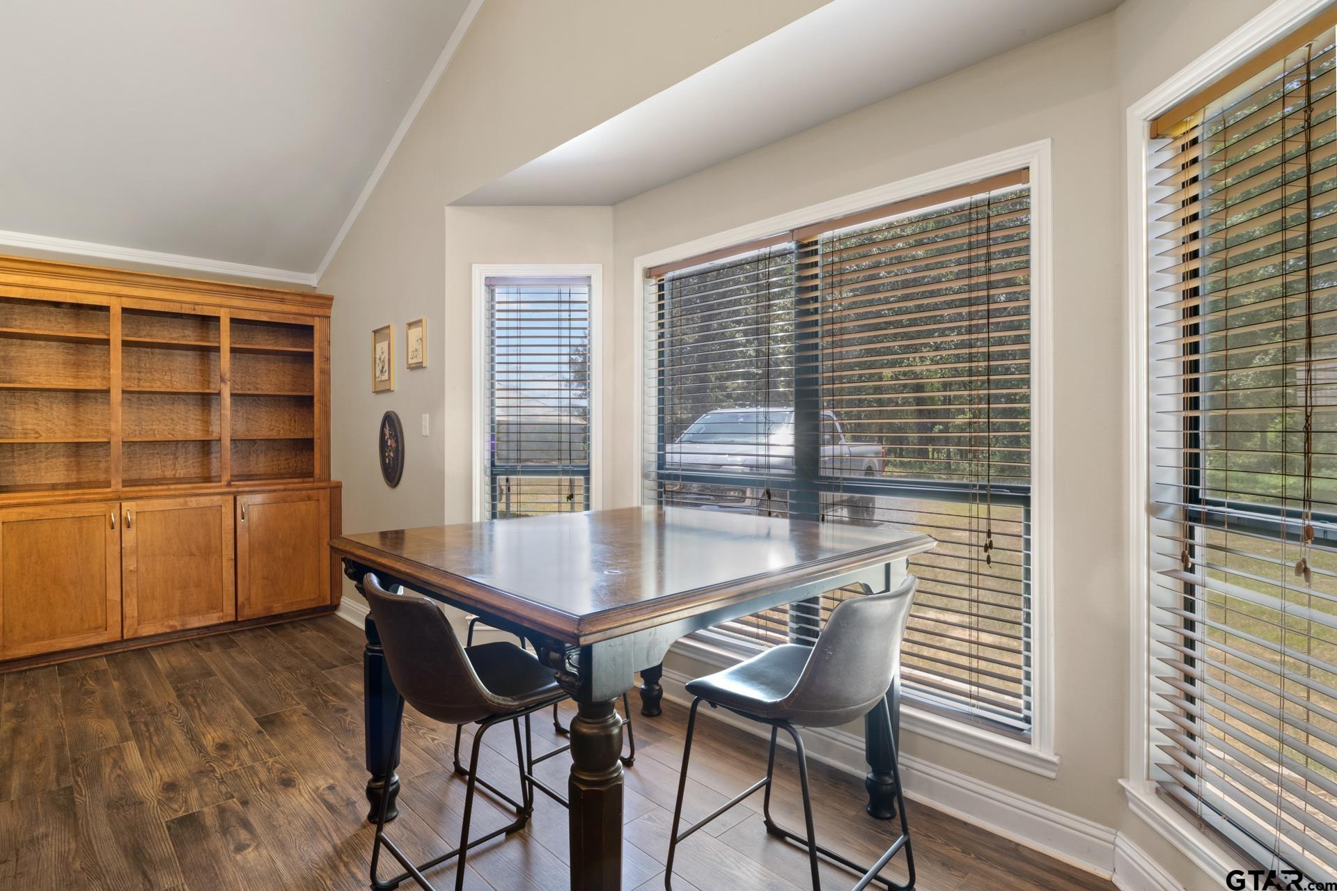 259 County Road 2407 Pittsburg, TX 75686 - Photo 18 of 42 a view of a dining room with furniture and window