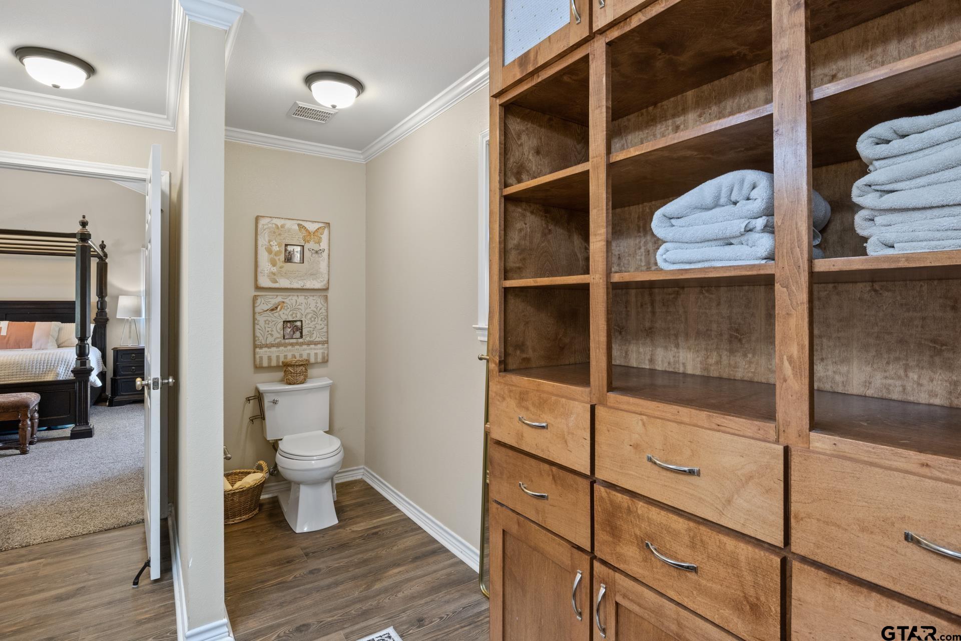 259 County Road 2407 Pittsburg, TX 75686 - Photo 33 of 42 a bathroom with a toilet