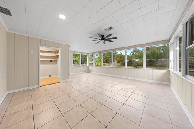 a view of an empty room and window