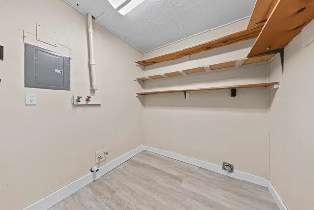 a view of a room with racks on the wall