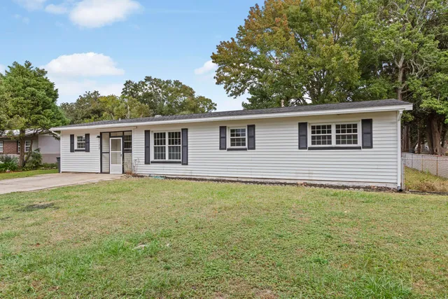 a house view with a garden space