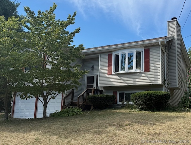 a house view with a backyard space