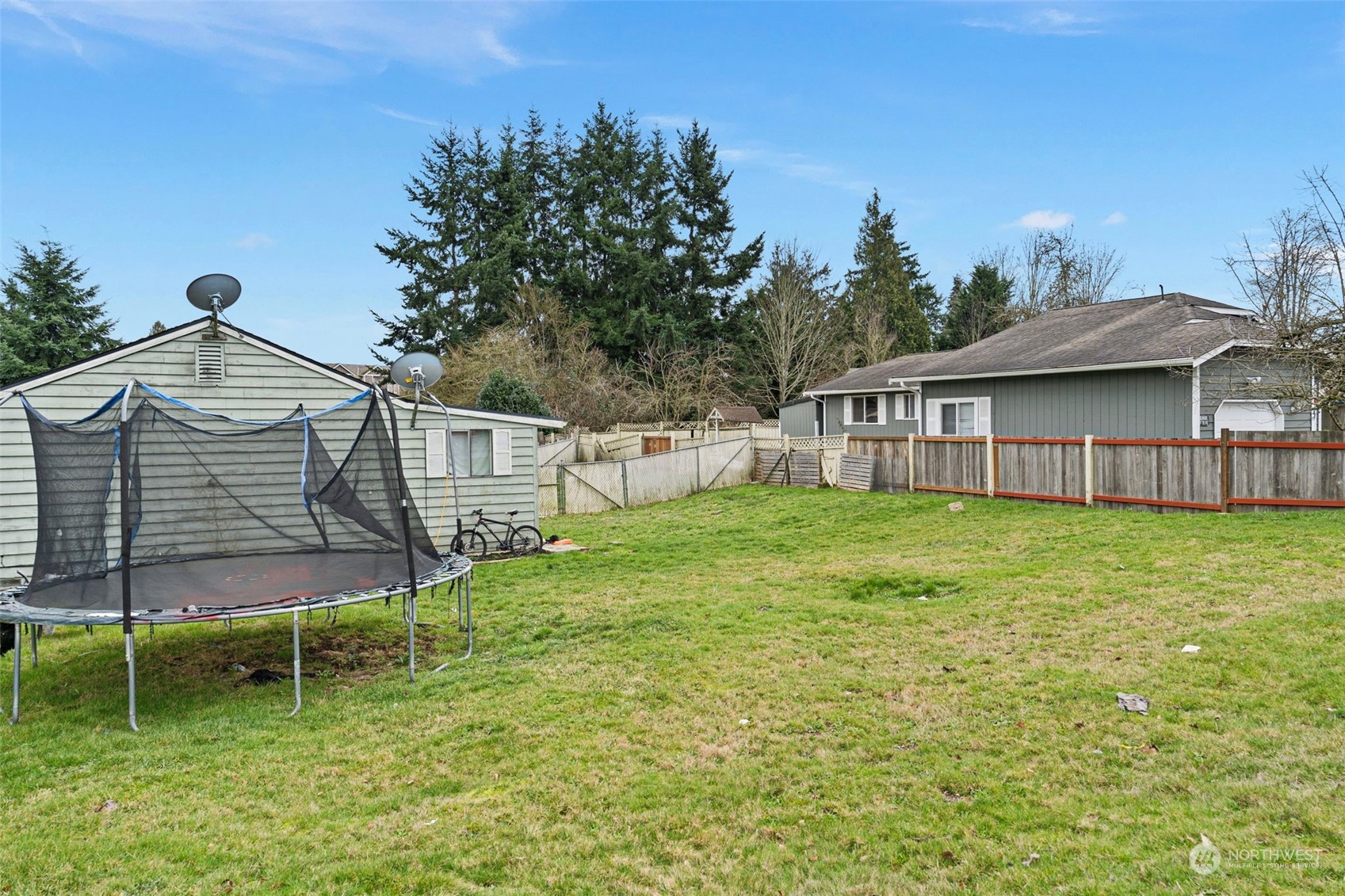11726 Center Road Everett, WA 98204 - Photo 6 of 34 a view of a house with a backyard