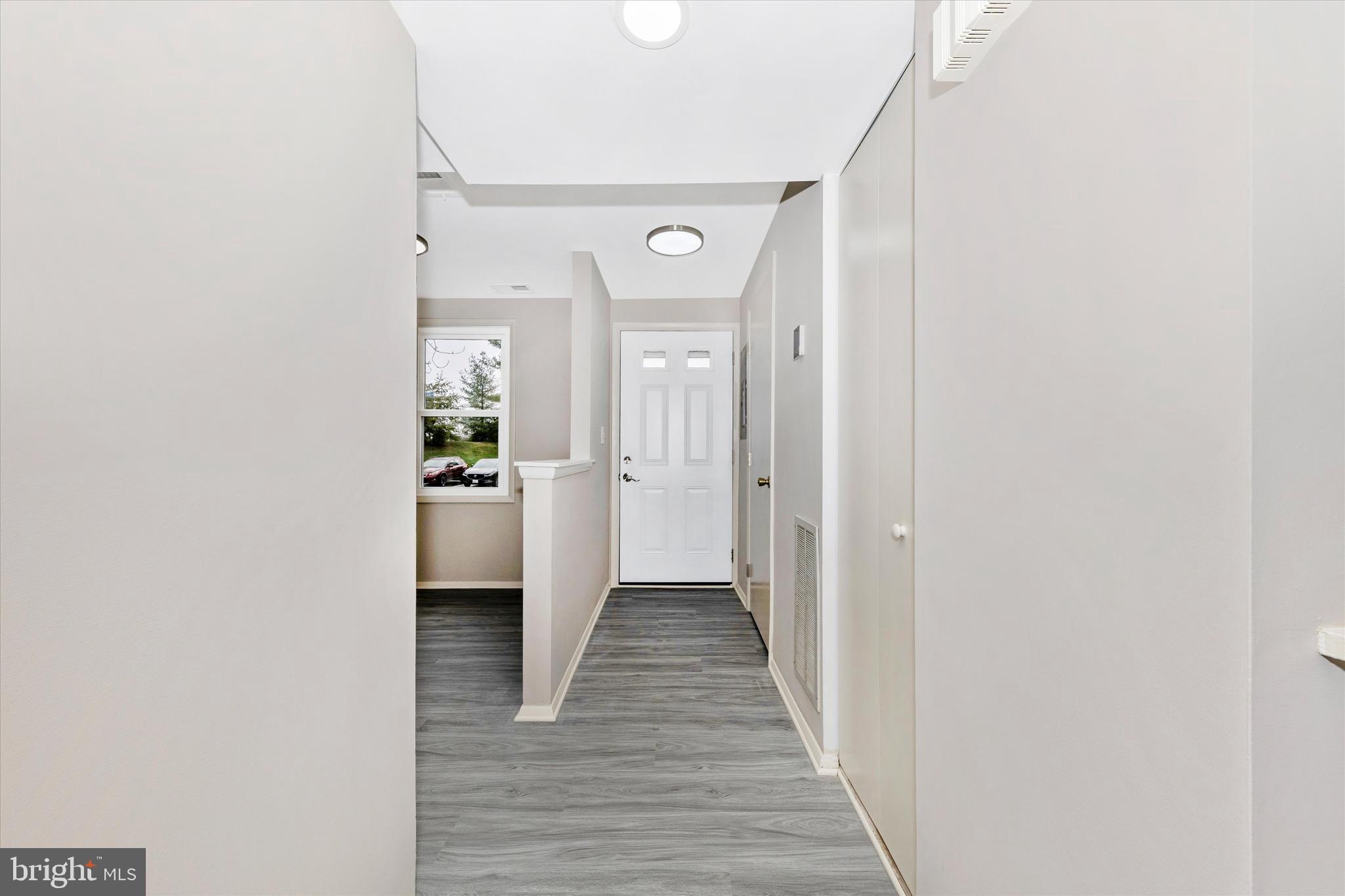 5818 Drawbridge Court Frederick, MD 21703 - Photo 5 of 36 Foyer with new light fixture