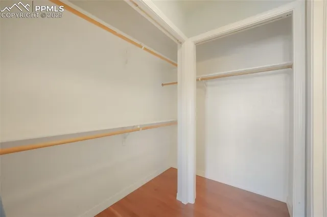 a en suite bathroom with a sink a toilet and a mirror