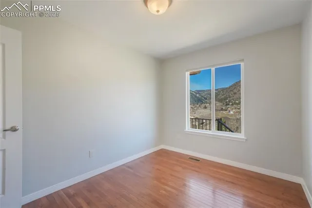 a view of a room that has a window in it