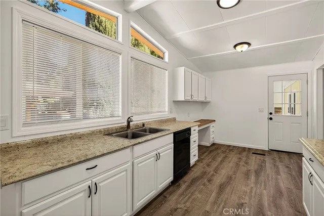 a view of cabinets and window