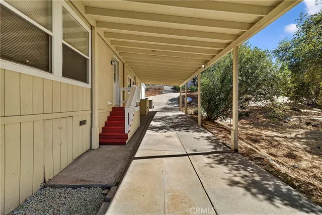 a view of a pathway with a patio