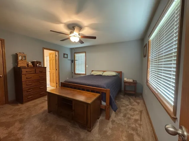 a view of hall way with furniture