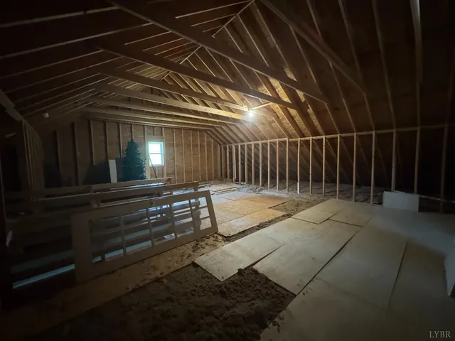a view of backyard with barbeque grill wooden floor and fence