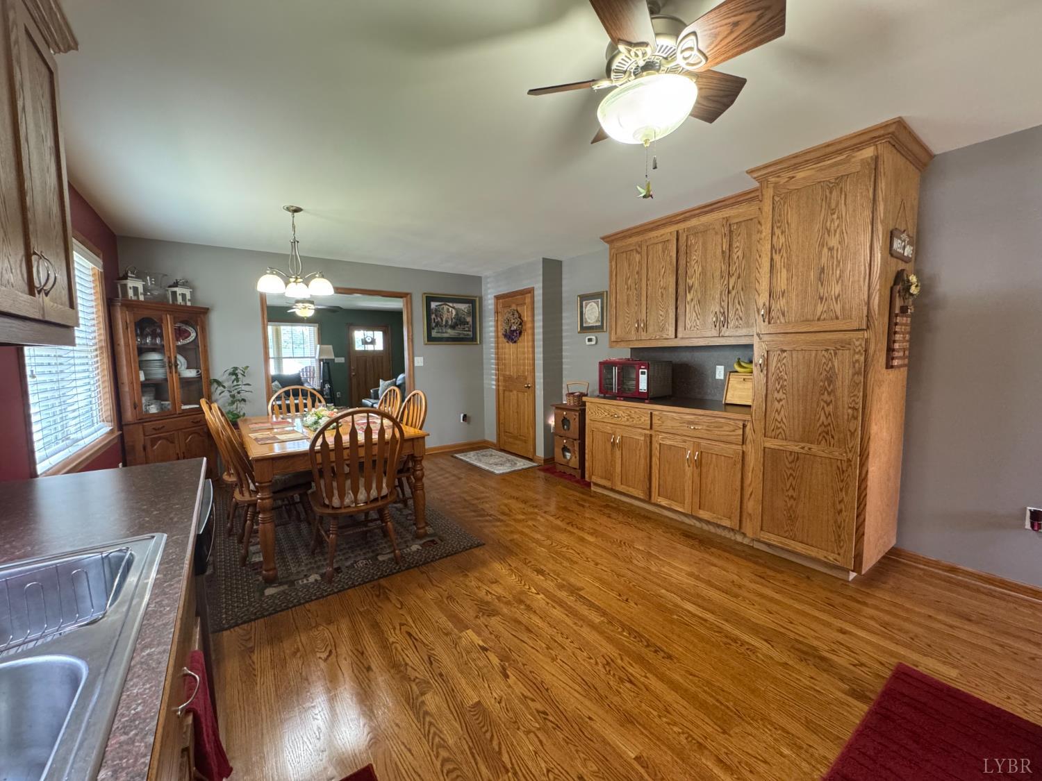 166 Dutch Lane Appomattox, VA 24522 - Photo 7 of 31 a view of a dining room with furniture window and wooden floor
