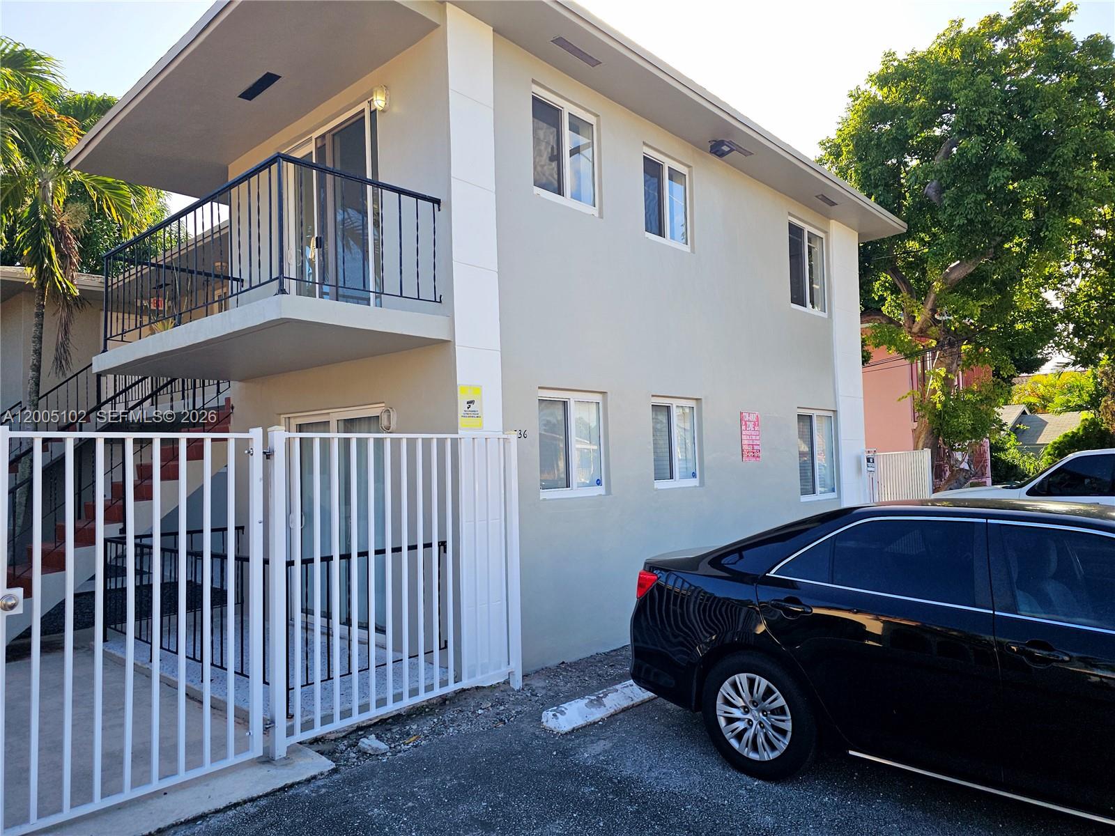 1736 Southwest 3rd Street, Unit 3 Miami, FL 33135 - Photo 10 of 10 a car parked in front of a house