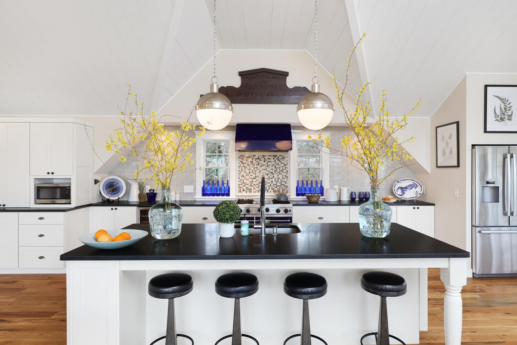 18 Snow Shore Road Orleans, MA 02653 - Photo 15 of 61 a kitchen with a table and chairs in it