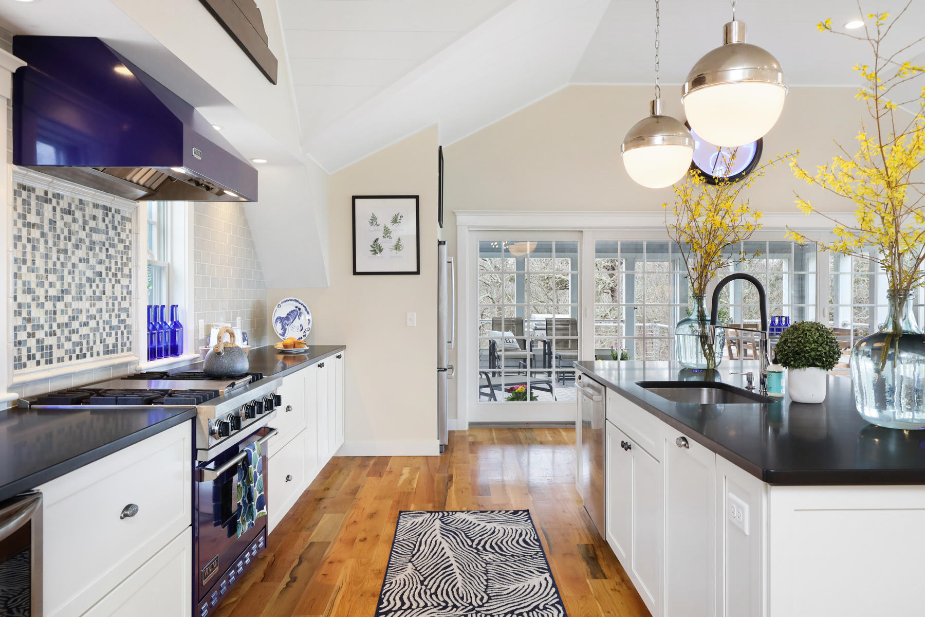 18 Snow Shore Road Orleans, MA 02653 - Photo 19 of 61 a kitchen with stainless steel appliances granite countertop a sink and cabinets