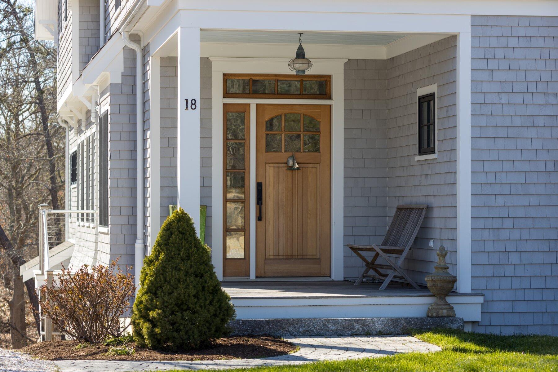 18 Snow Shore Road Orleans, MA 02653 - Photo 3 of 61 a front view of a house with a yard