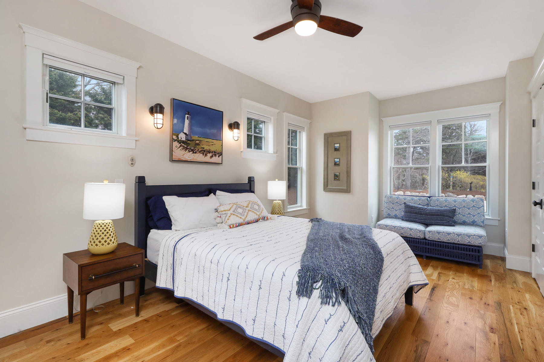 18 Snow Shore Road Orleans, MA 02653 - Photo 38 of 61 a spacious bedroom with a bed and a couch