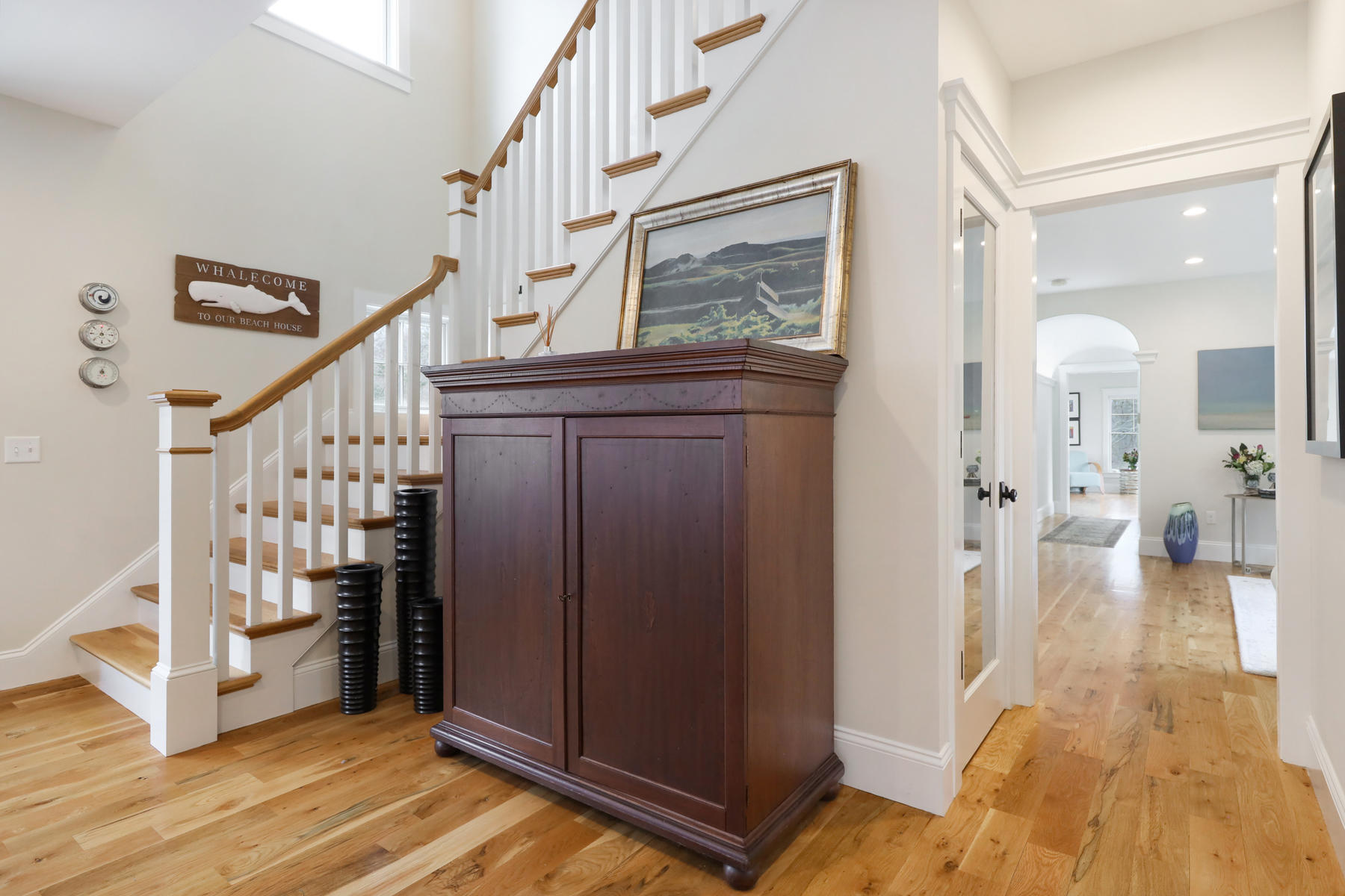 18 Snow Shore Road Orleans, MA 02653 - Photo 8 of 61 a view of a hallway view with wooden floor and staircase