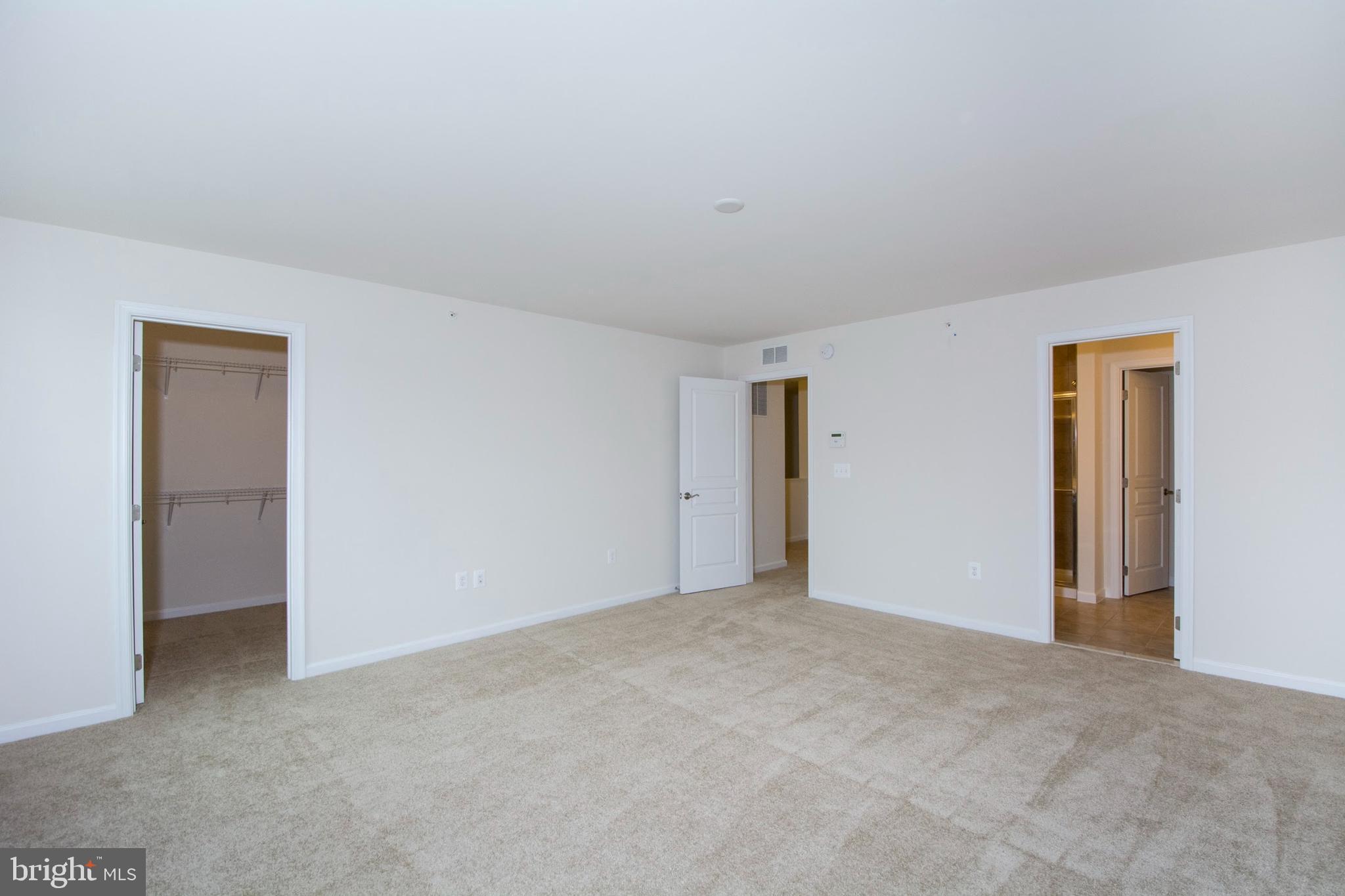 14894 Mason Creek Circle Woodbridge, VA 22191 - Photo 17 of 25 a view of an empty room and closet area