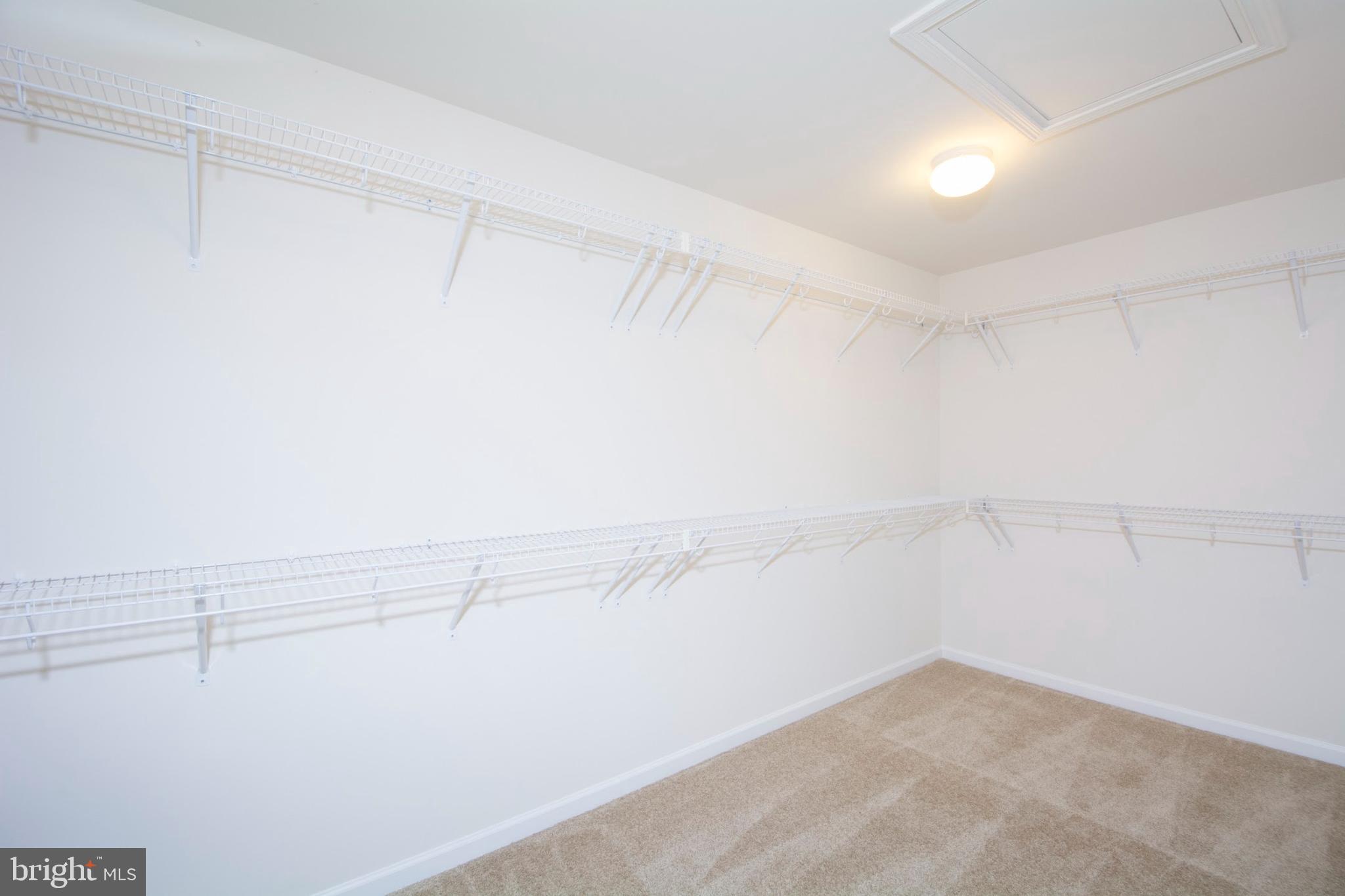 14894 Mason Creek Circle Woodbridge, VA 22191 - Photo 18 of 25 a view of a room with racks on the wall