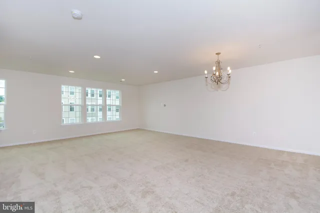 en empty room with windows