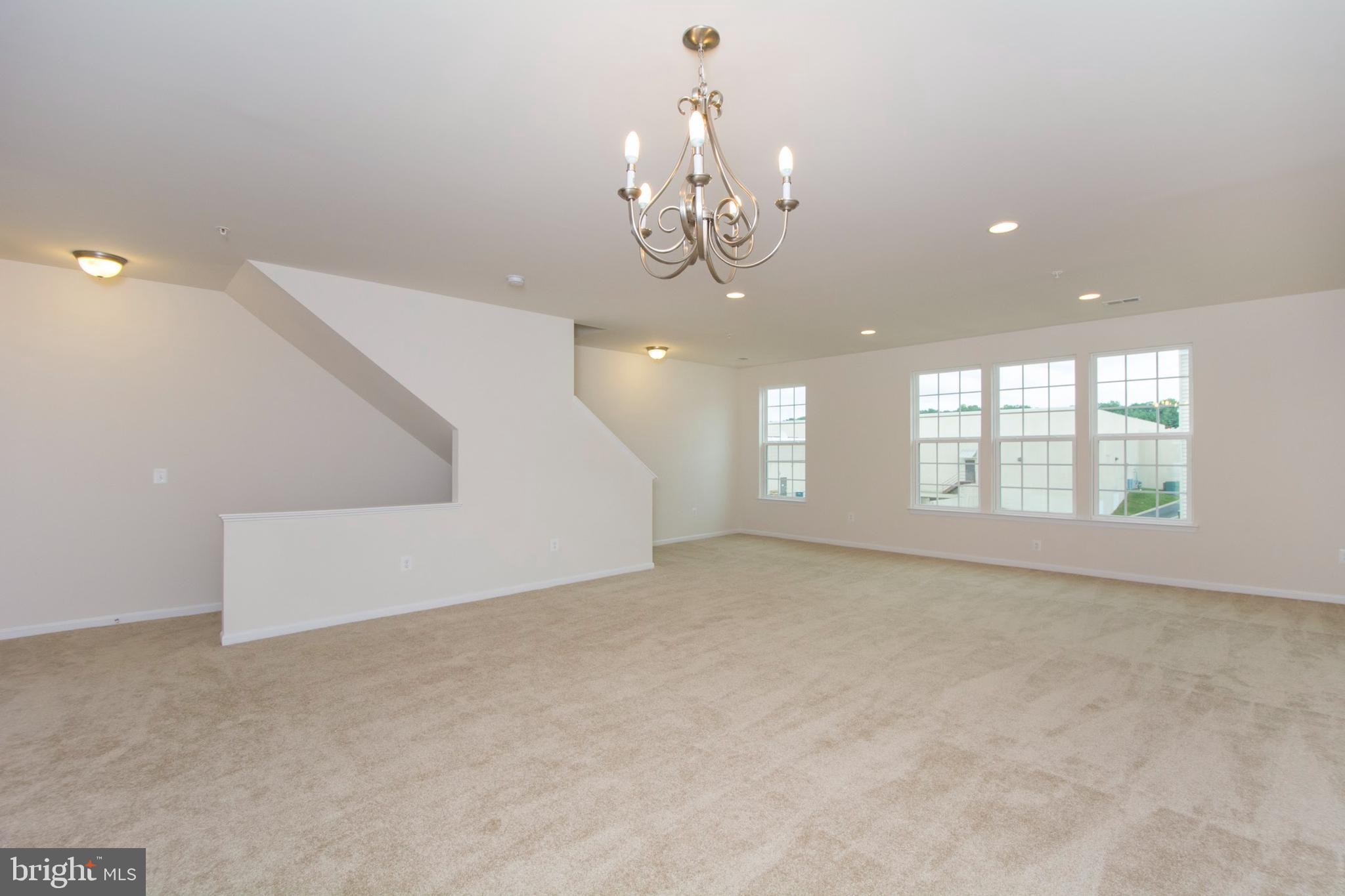 14894 Mason Creek Circle Woodbridge, VA 22191 - Photo 9 of 25 wooden floor in an empty room with a window