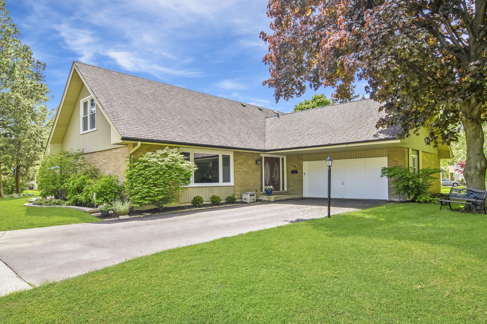 4 Burning Tree Road Rolling Meadows, IL 60008 - Photo 1 of 31 a view of a house with a yard and tree s