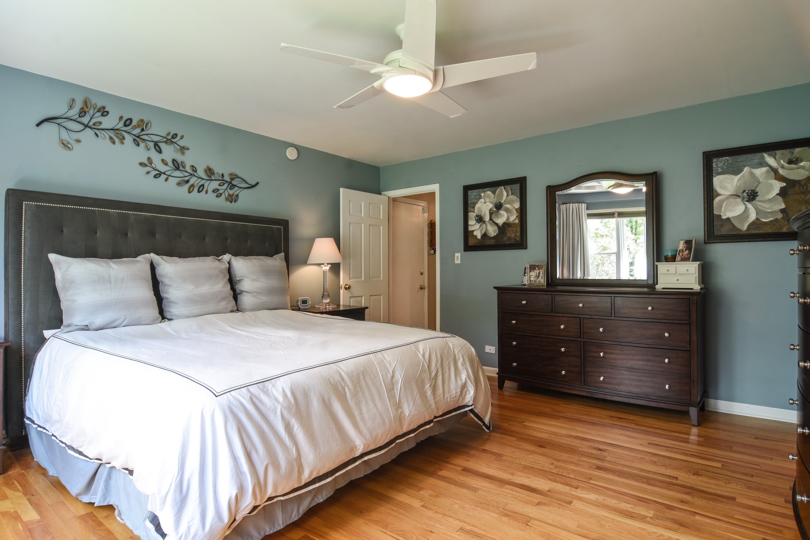 4 Burning Tree Road Rolling Meadows, IL 60008 - Photo 15 of 31 a bedroom with a bed and a dresser