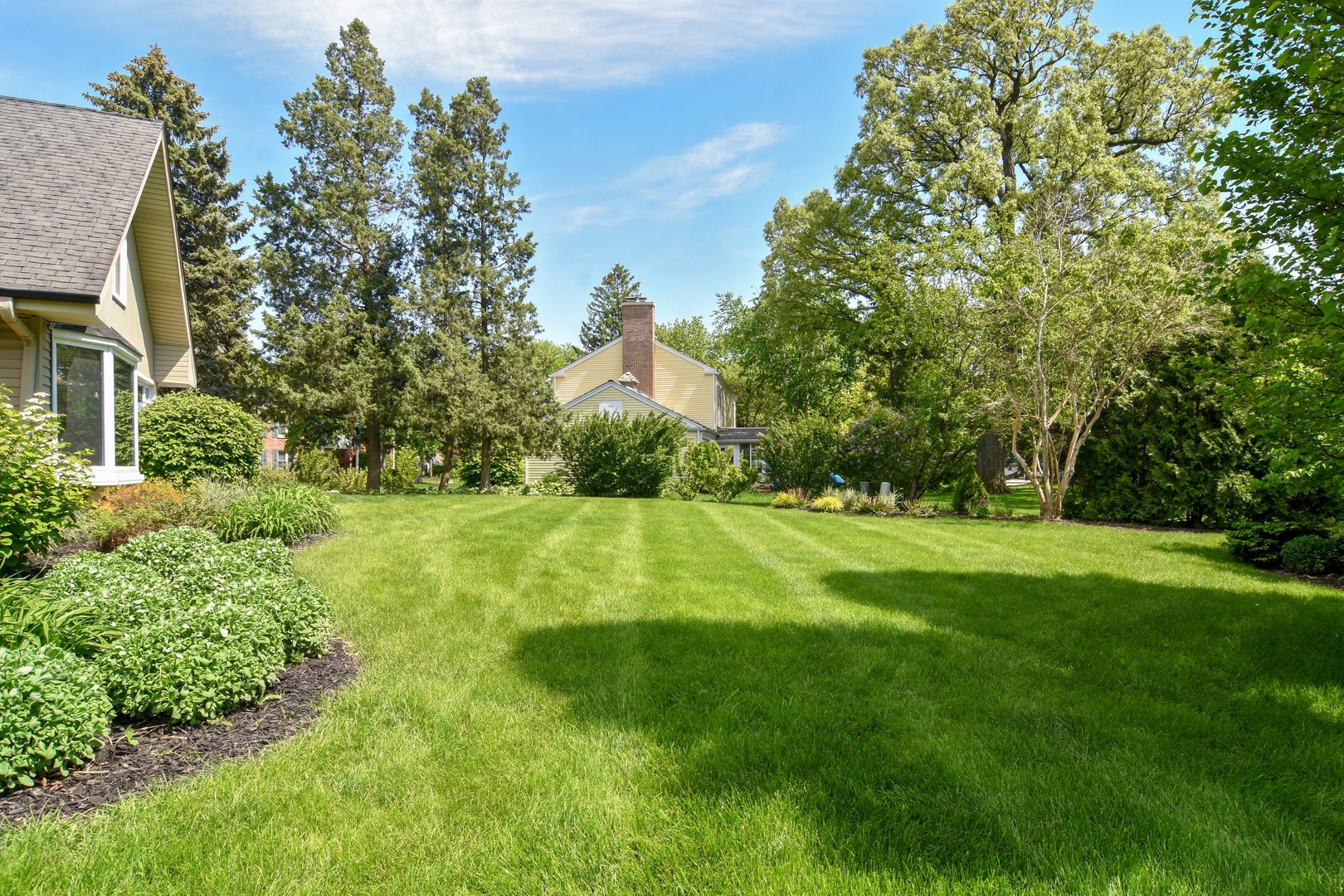 4 Burning Tree Road Rolling Meadows, IL 60008 - Photo 31 of 31 a view of yard with swimming pool and green space