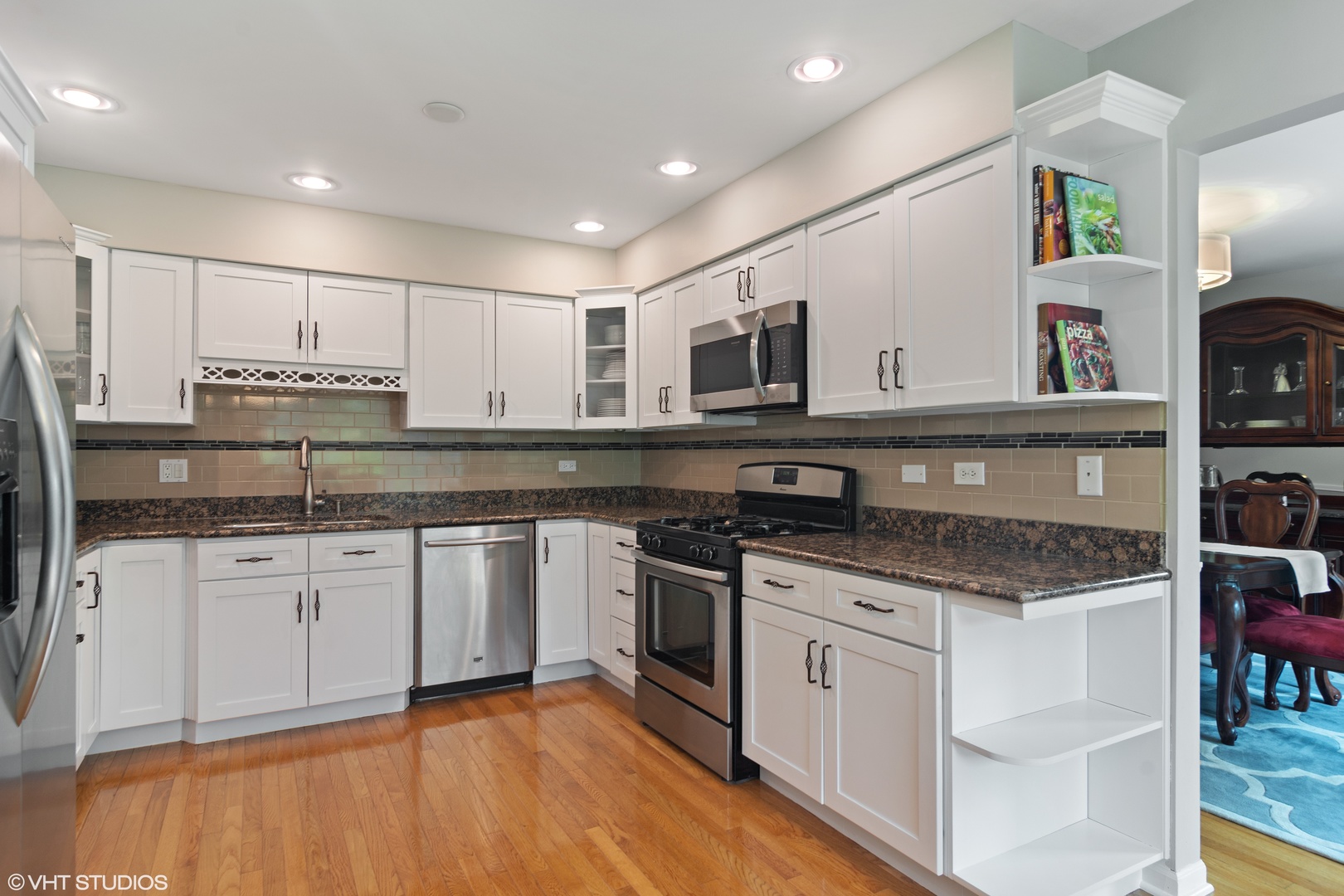 4 Burning Tree Road Rolling Meadows, IL 60008 - Photo 5 of 31 a kitchen with stainless steel appliances granite countertop a stove and a sink