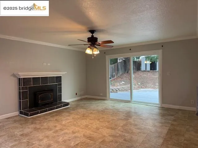 a view of an empty room with glass door