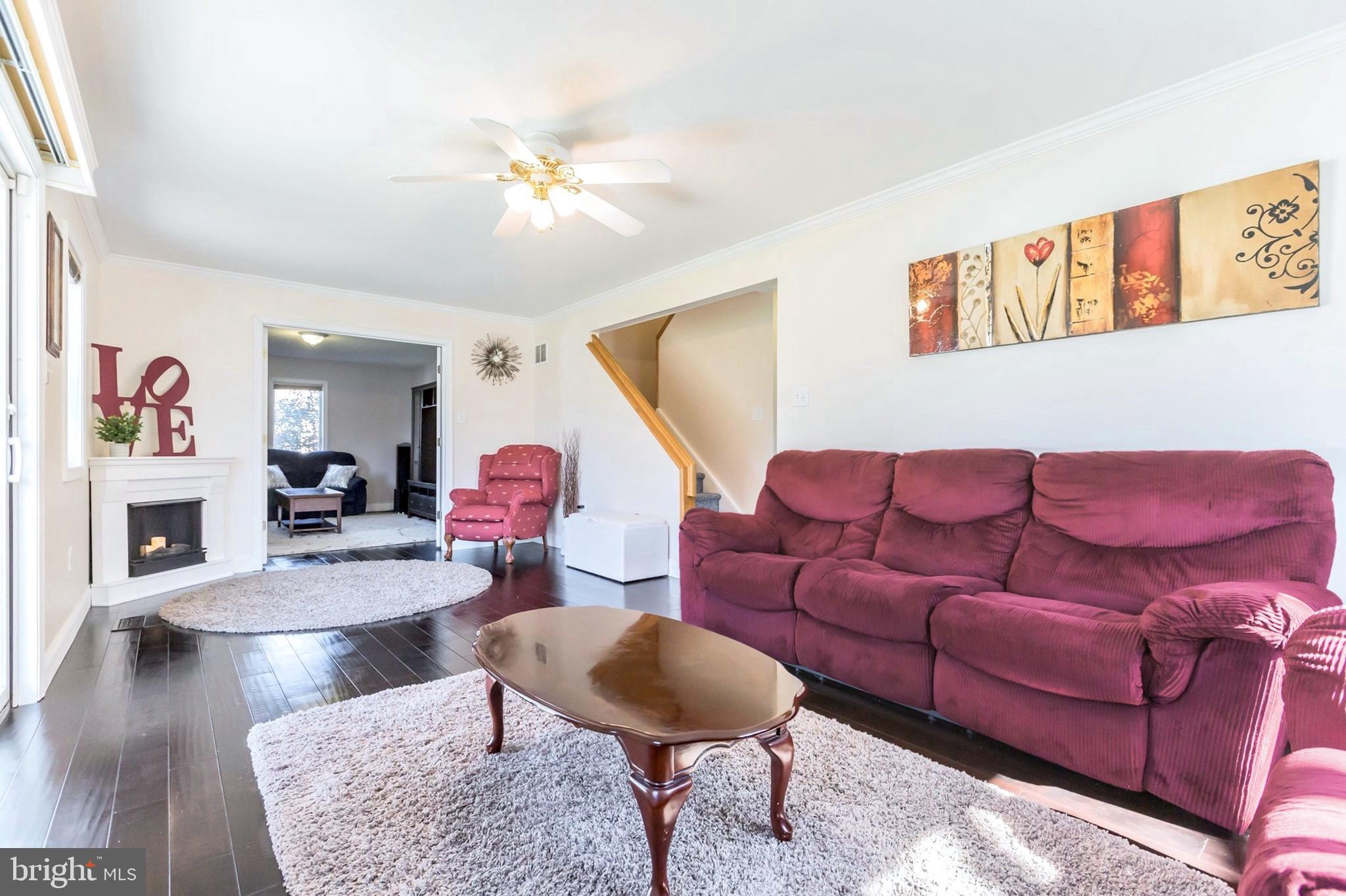 525 Coles Mill Road Haddonfield, NJ 08033 - Photo 11 of 36 a living room with furniture and a wooden floor