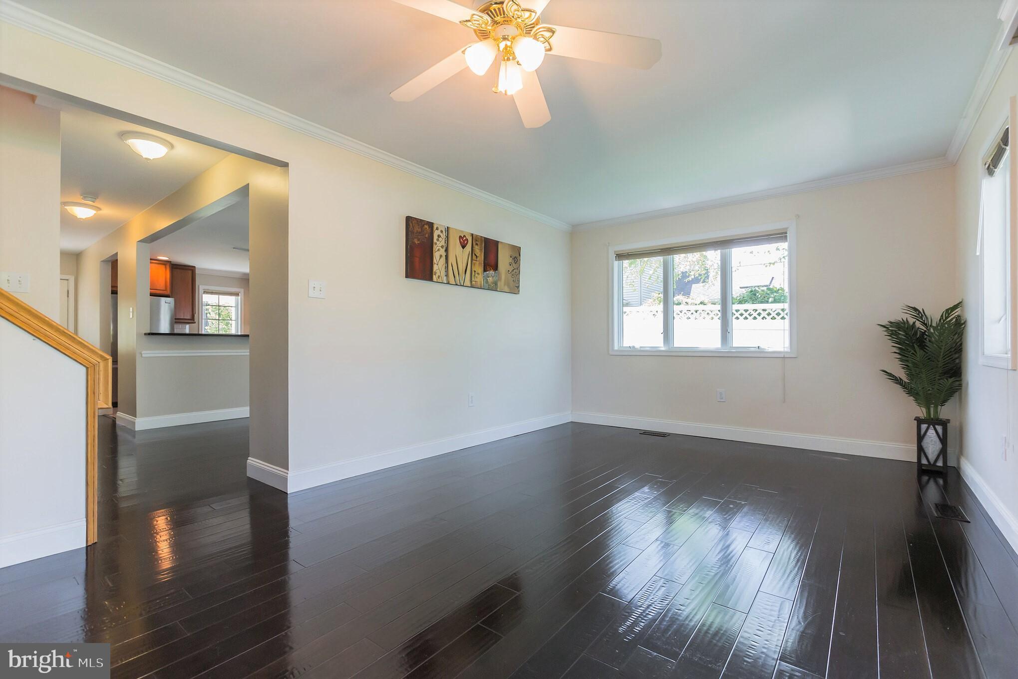 525 Coles Mill Road Haddonfield, NJ 08033 - Photo 12 of 36 a view of an empty room with wooden floor and a window
