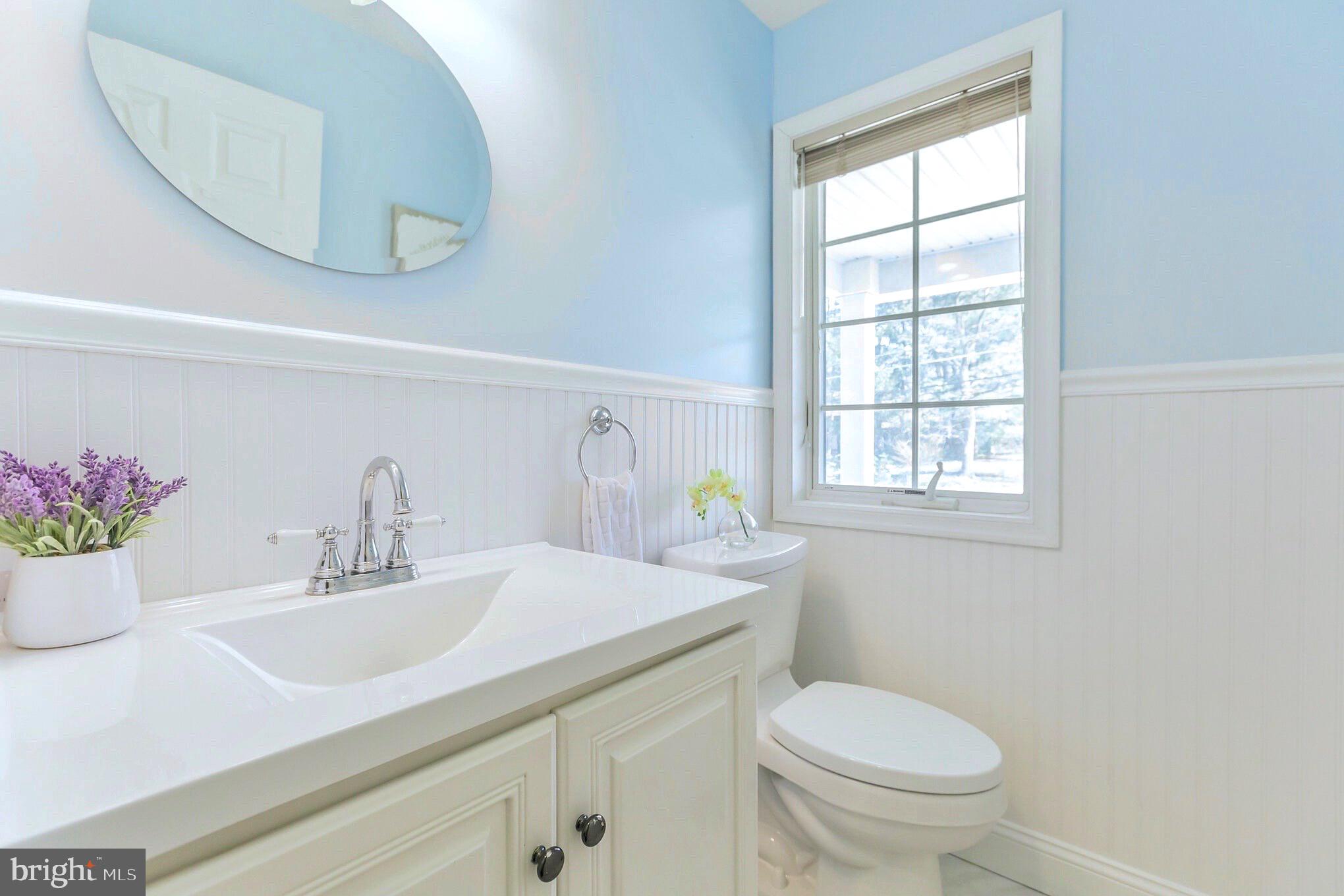 525 Coles Mill Road Haddonfield, NJ 08033 - Photo 16 of 36 a bathroom with a sink toilet and window