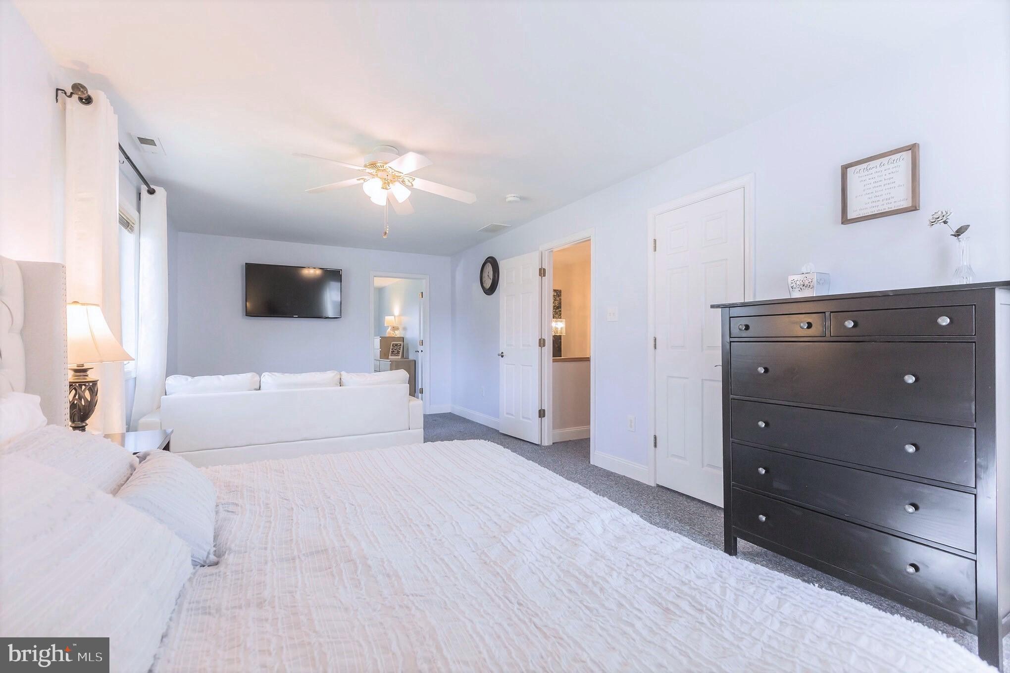525 Coles Mill Road Haddonfield, NJ 08033 - Photo 19 of 36 a view of a bedroom and a large bed