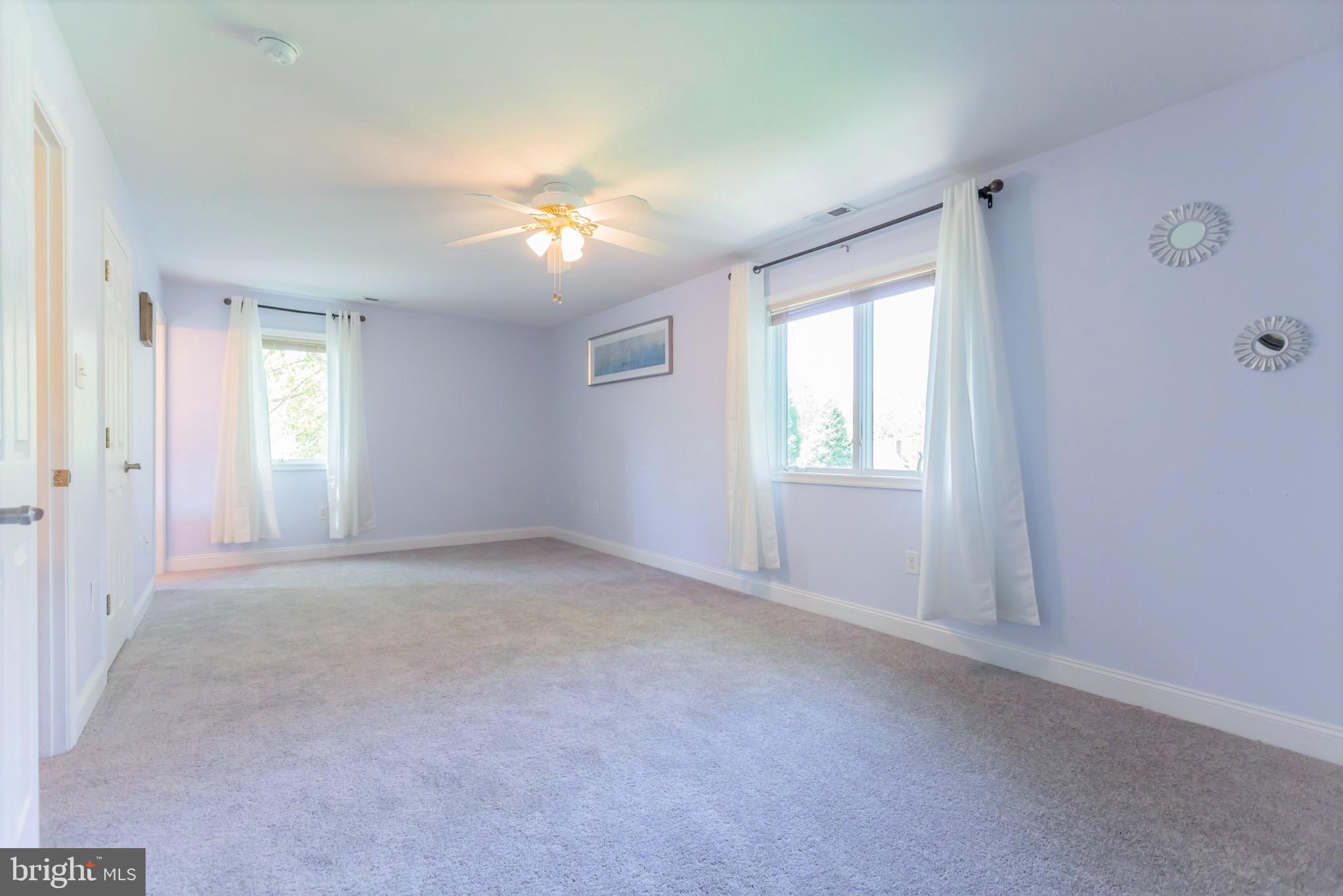 525 Coles Mill Road Haddonfield, NJ 08033 - Photo 21 of 36 a view of an empty room with a window