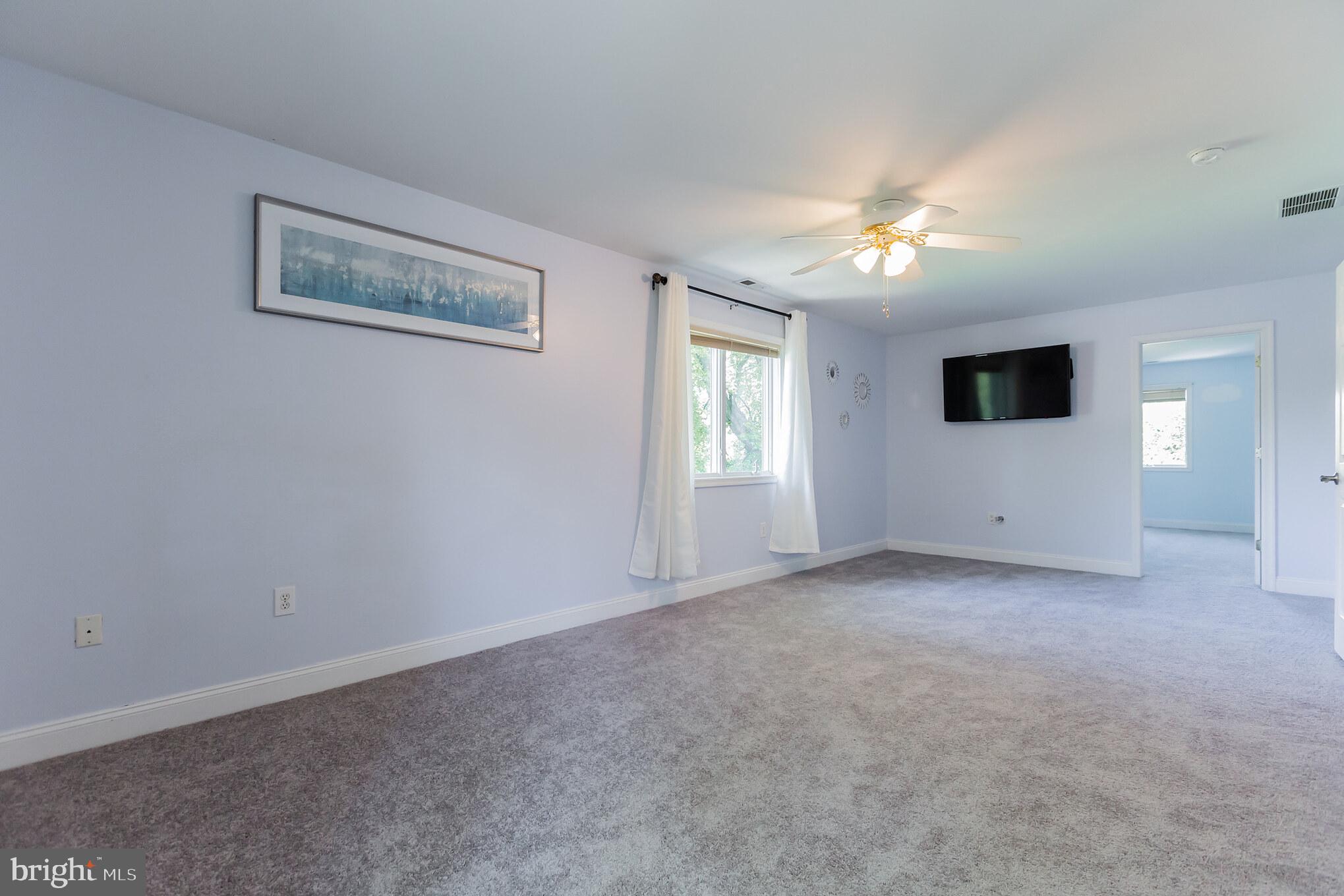 525 Coles Mill Road Haddonfield, NJ 08033 - Photo 22 of 36 a view of empty room with windows